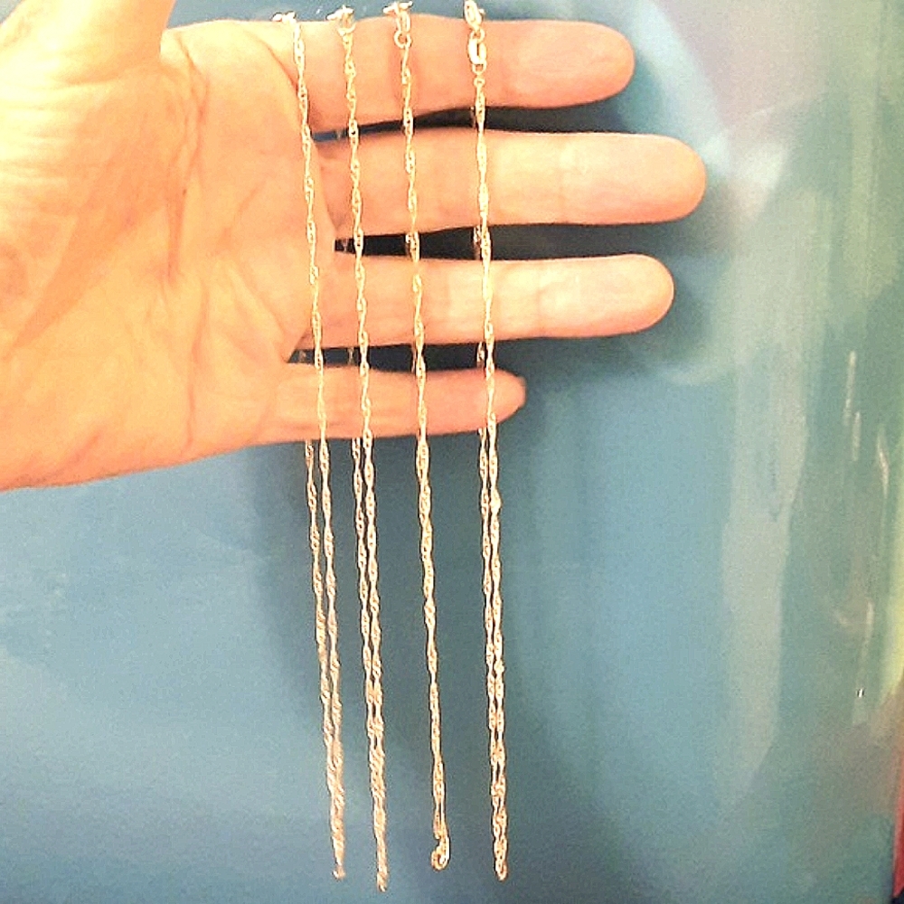 4 Sterling Silver Chains.